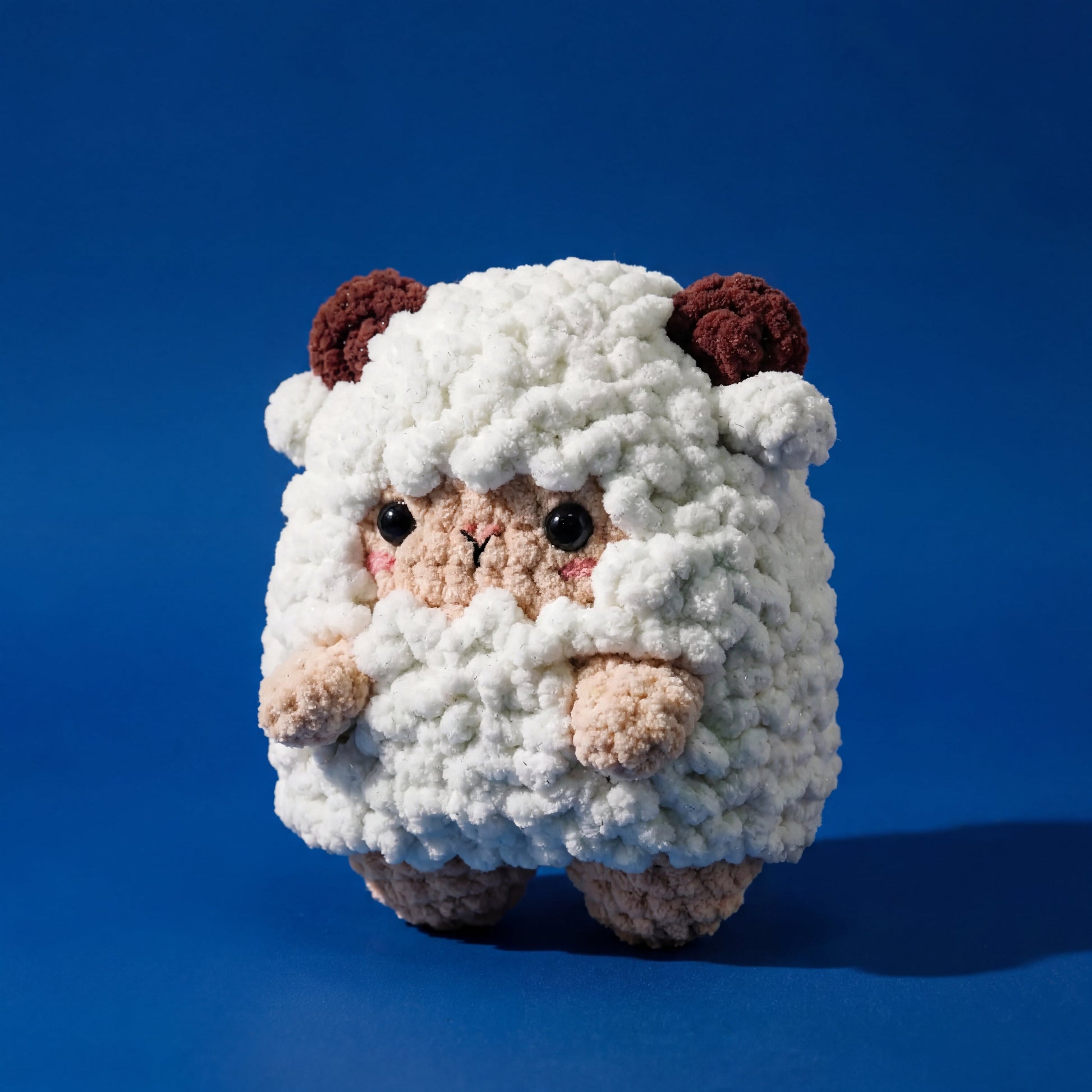 Craft an adorable sheep amigurumi with this comprehensive crochet pattern and kit from WoolyArtis. Designed for minimal sewing, this project combines accessible techniques with professional results. The pattern PDF includes detailed instructions for creating a plush, huggable sheep doll, while the optional kit provides pre-selected yarns and materials to streamline your creative process. Perfect for crocheters seeking a rewarding handmade project that yields a charming finished piece suitable for gifting or